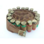 Shooting: A Brady canvas & leather 12 bore cartridge belt,