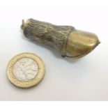 A brass vesta case in the form of a horses lower leg and hoof.