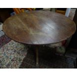 An oak circular tilt top breakfast table The vendor kindly informs us that this table was removed