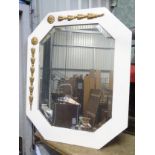 A white painted and gilt octagonal hall mirror with bevelled glass CONDITION: Please
