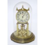 A anniversary clock with a glass dome CONDITION: Please Note - we do not make