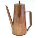 An early 20thC Danish Art Deco copper and rosewood coffee pot. 10 1/4" high.