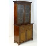 A late 19thC mahogany glazed secretaire bookcase,