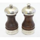 2 turned wooden pepper mills / grinders with silver mounts hallmarked London 1986/89 maker