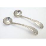 A pair of silver Fiddle Pattern salt spoons possibly by James Newman Dunsford Exter 1811 .