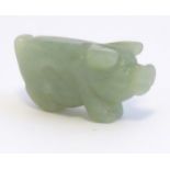 A Chinese carved jade pig,