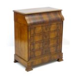 A 19thC continental mahogany gentleman's dressing chest with lid lifting to reveal a marble lined