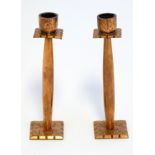 Art Deco: a pair of small copper candlesticks with squared detail and engraved decoration, 4” high.