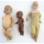 Three early c1900 dolls,