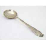 A Danish silver souvenir spoon marked Denmark and bearing marks for 1919, Christian F Heise. and J.