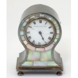 Silver plate miniature balloon clock: a HAC mother of pearl and silver plate mantel clock the 1