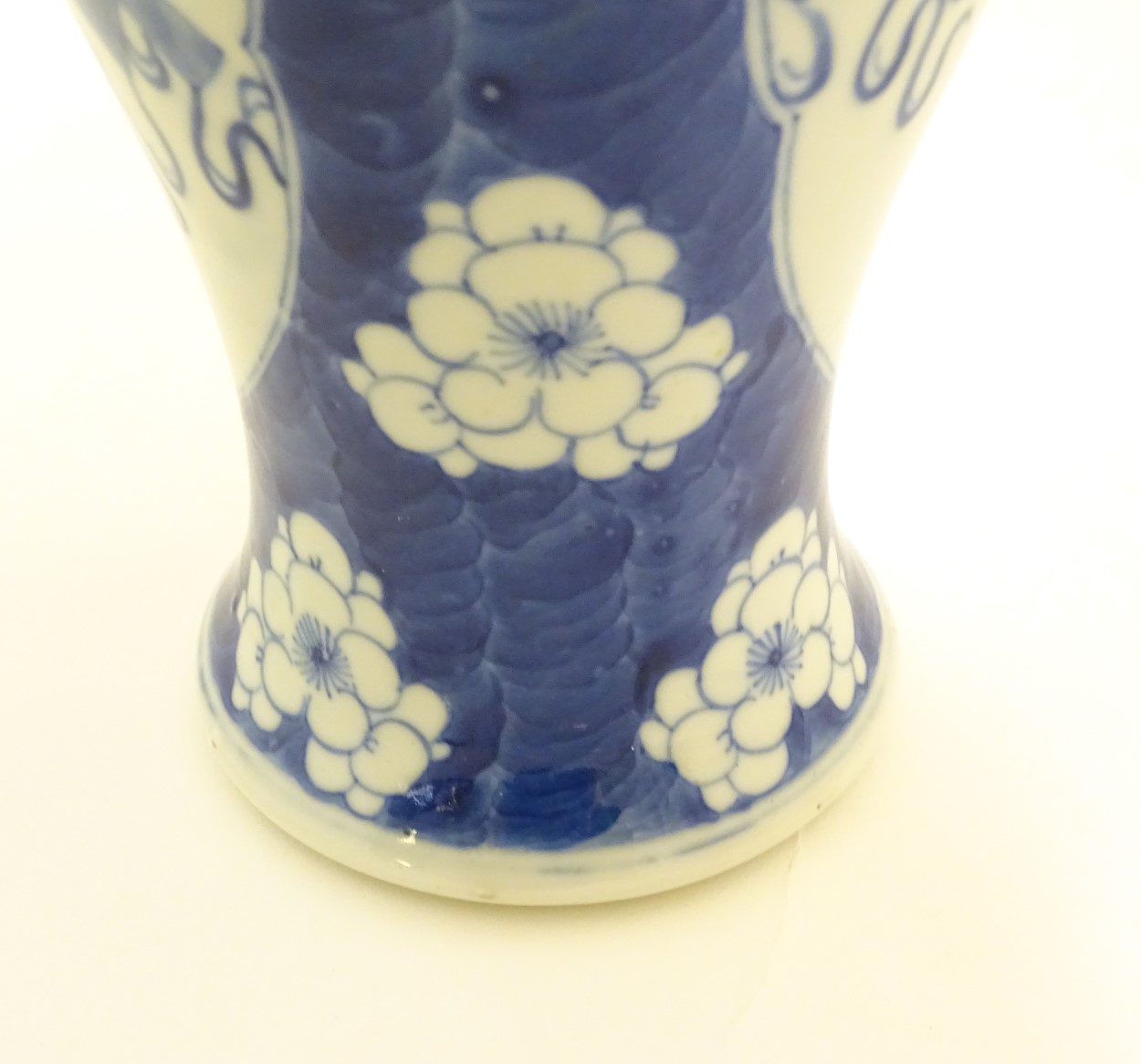 A Chinese, blue and white baluster vase decorated with prunus flowers, - Image 12 of 12