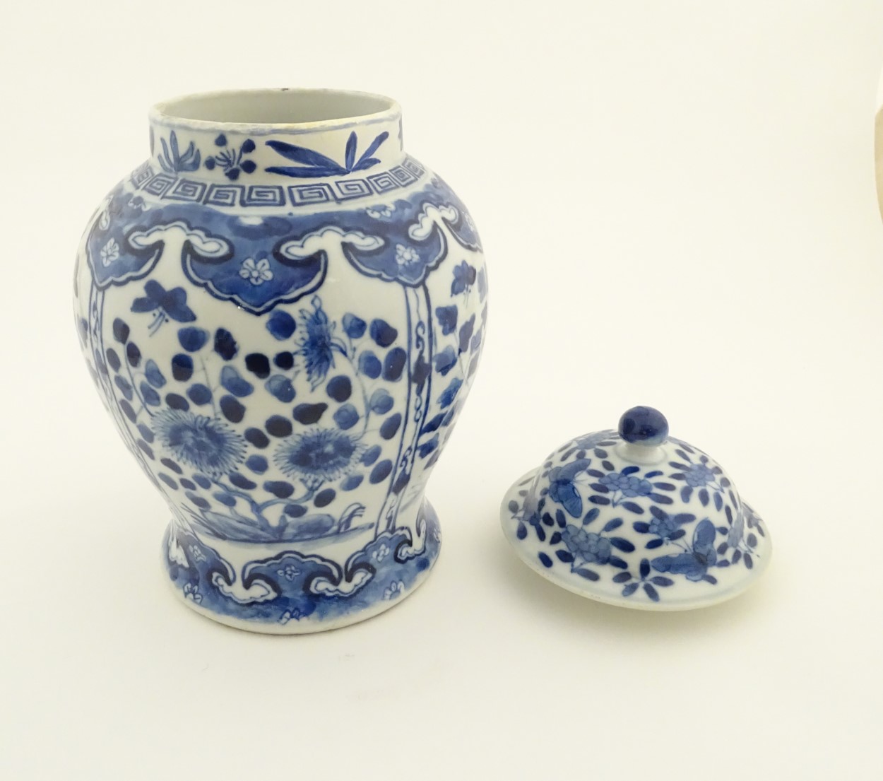 A Chinese blue and white ginger jar with panelled floral and butterfly decoration, - Image 3 of 10