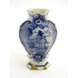 A Delft blue and white hexagonal baluster formed vase,