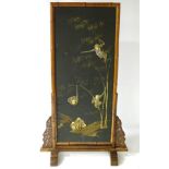 An early 20thC Japanese Aesthetic movement screen on stand, of bamboo and hardwood construction,