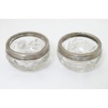 A pair of cut glass salts with silver rims London 1913 maker William Henry Sparrow 2 1/2" diameter