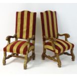 A pair of mid / late 19thC open armchairs with scrolled chamfered arms and standing on shaped legs