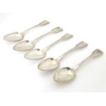 A set of 4 silver fiddle pattern dessert spoons hallmarked London 1829 maker William Eaton together