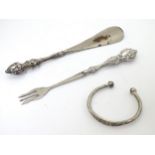 A silver handled pickle fork with silver handed shoe horn and silver bracelet (3)