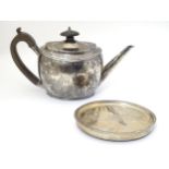 A Georgian silver teapot and teapot stand both hallmarked London 1799 maker William Allen III.