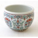 A Chinese doucai bowl, with scrolling foliage and flower decoration.