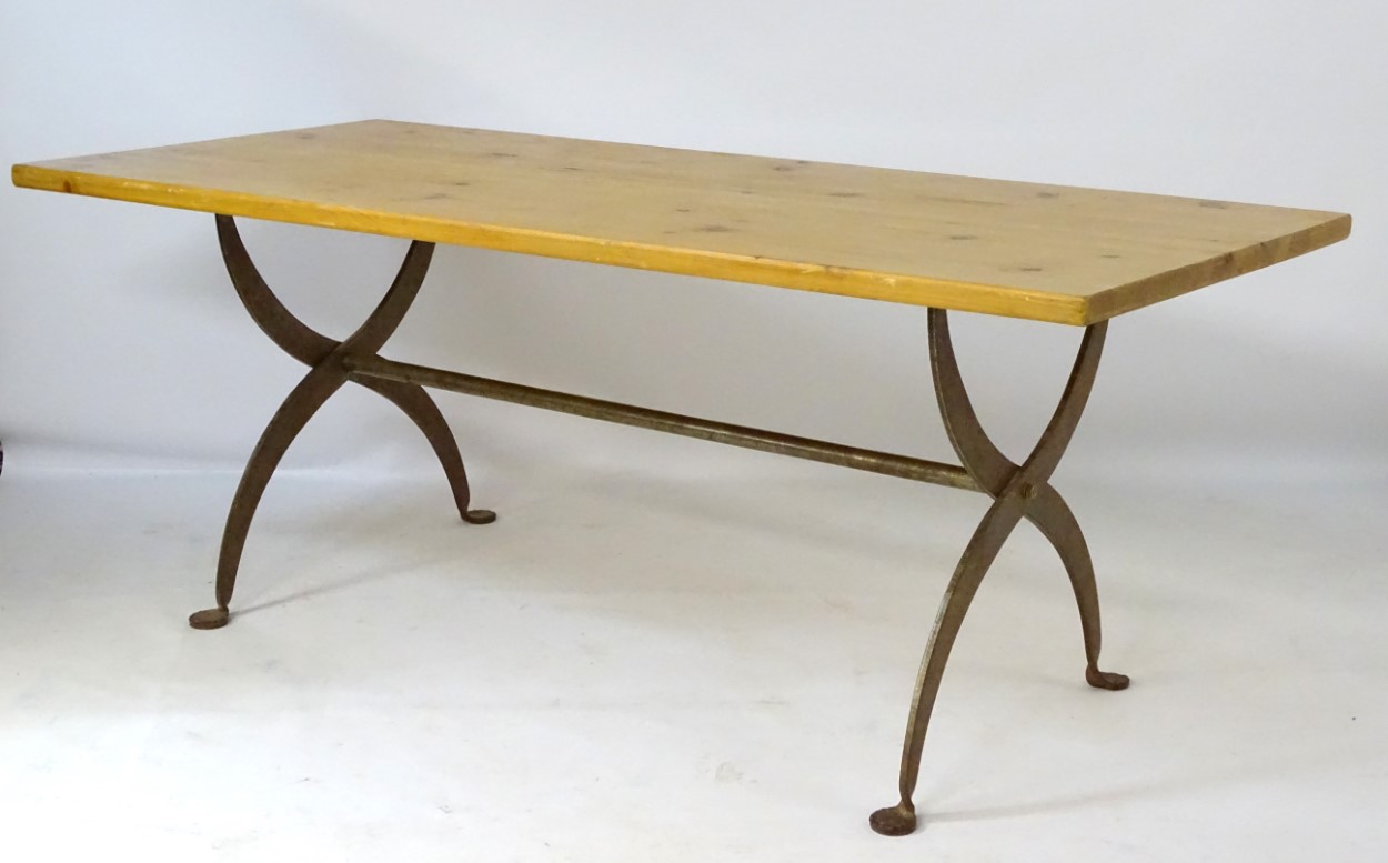 A late 20thC pine topped dining table with a wrought iron X-framed base having a central trestle - Image 5 of 5
