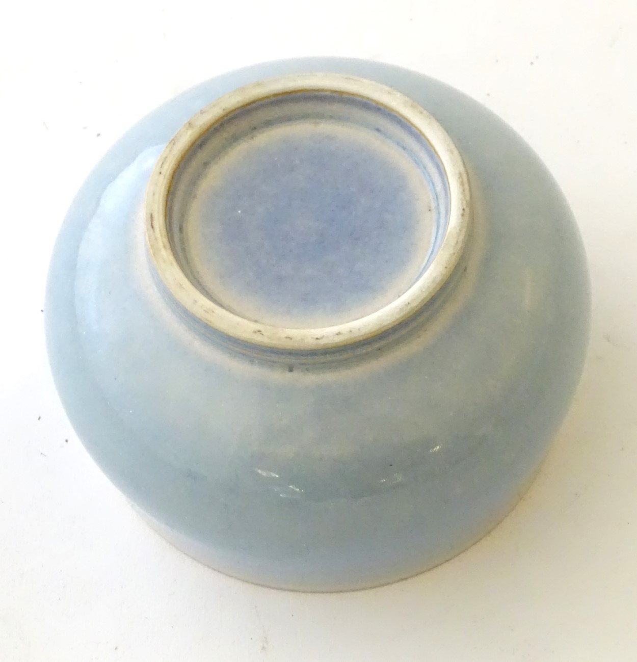 An unmarked high fired blue glazed bowl. Approx. 3" high. - Image 2 of 5