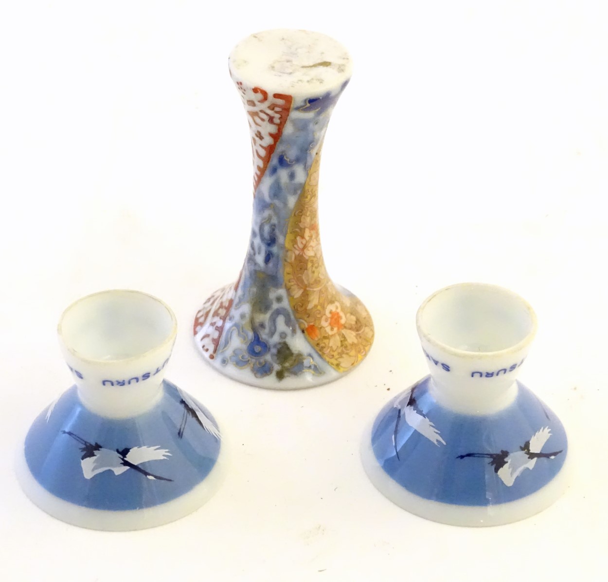 A pair of Japanese porcelain sake cups advertising Hakutsuru, decorated with flying cranes. - Image 7 of 8