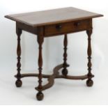 An 18thC oak William and Mary table,