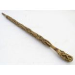 Walking Stick : a 19thC cork stick, the shaft and Knop with cork covering, 34 3/4" long.