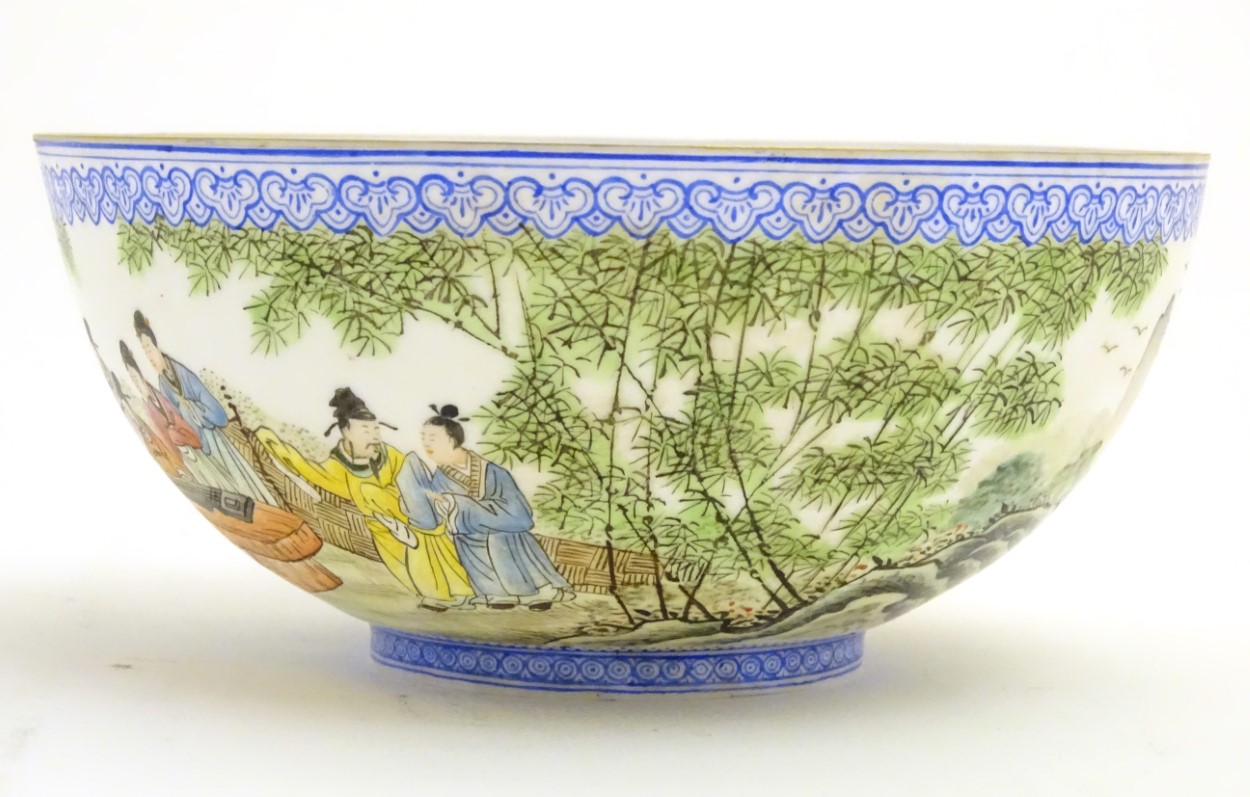 A Chinese eggshell bowl depicting Oriental figures watching a guqin performance in a landscape. - Image 6 of 7