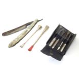 2 silver cigarette mouthpieces together with silver handled small manicure tools and a mother of