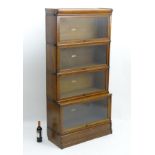 An early / mid 20thC oak ‘Globe Wernicke’ modular bookcase,