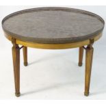 A mid 19thC mahogany table with marble top and brass gallery,