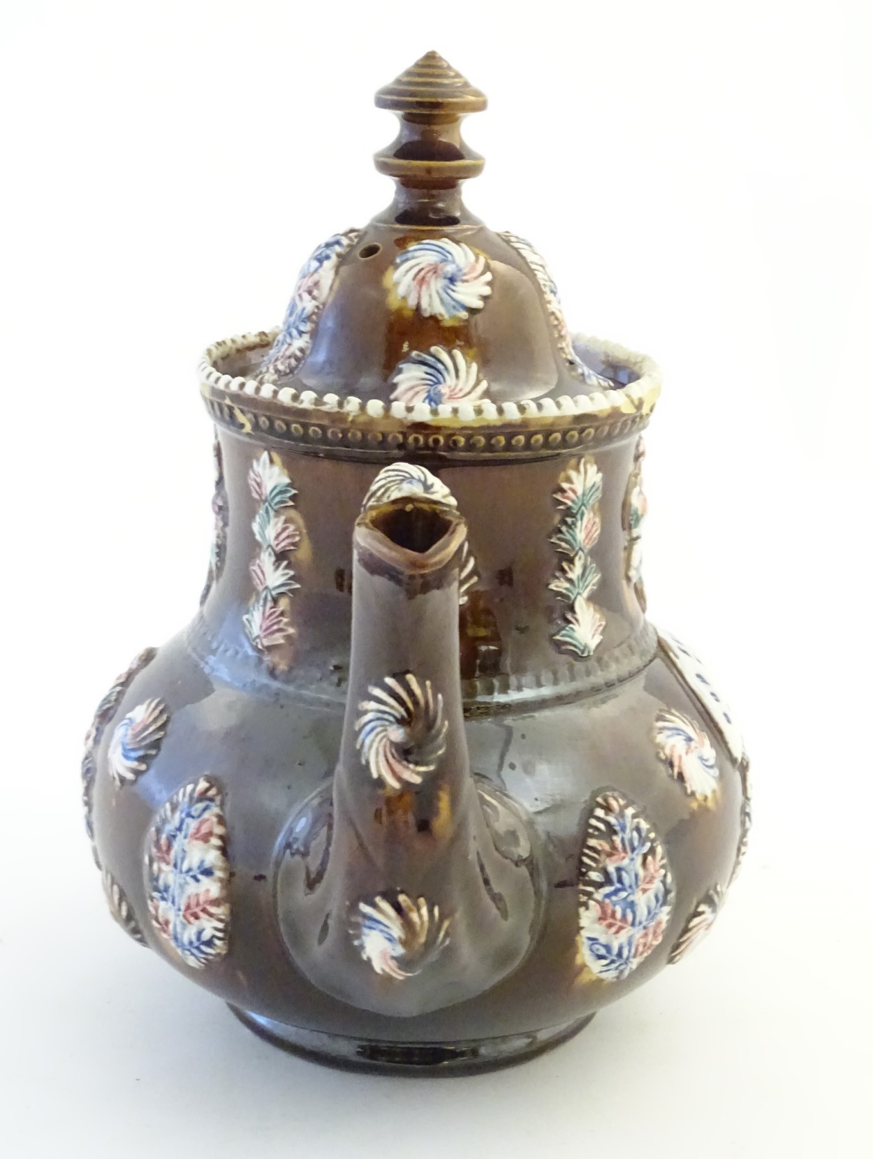 A late 19thC Measham bargeware teapot and cover with floral decoration surrounding a plaque - Image 4 of 8