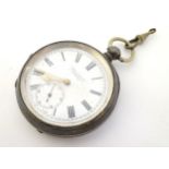 Fattorini Manchester : a silver key wind pocket watch, with white enamel dial, gilt hands,