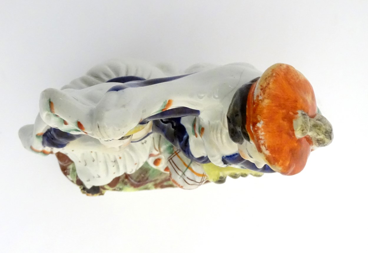 A Victorian Staffordshire pottery figural group of a man and a woman in highland dress, - Image 6 of 6