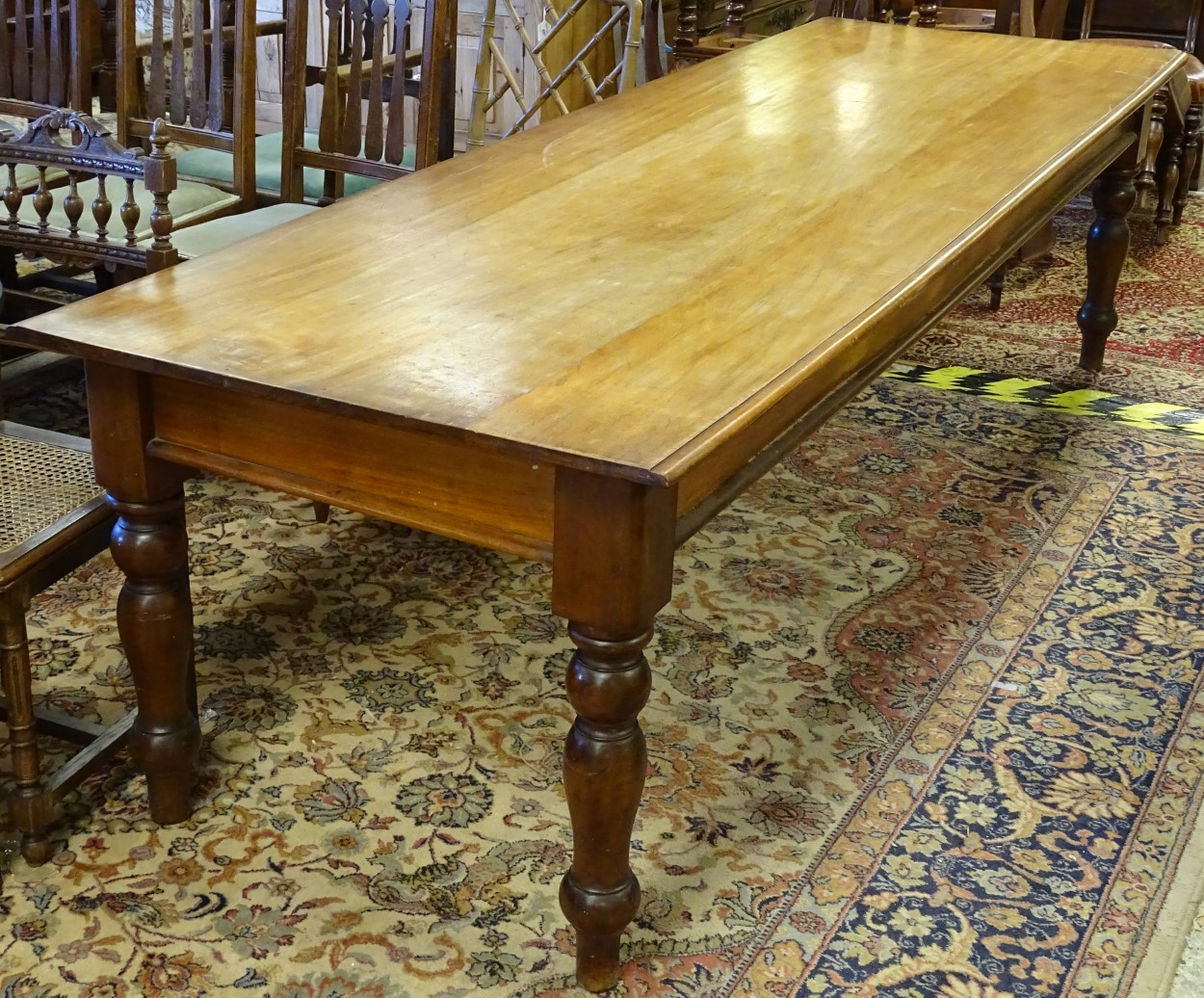 A late 19thC mahogany boardroom table / dining table standing on turned tapering legs. - Image 5 of 5