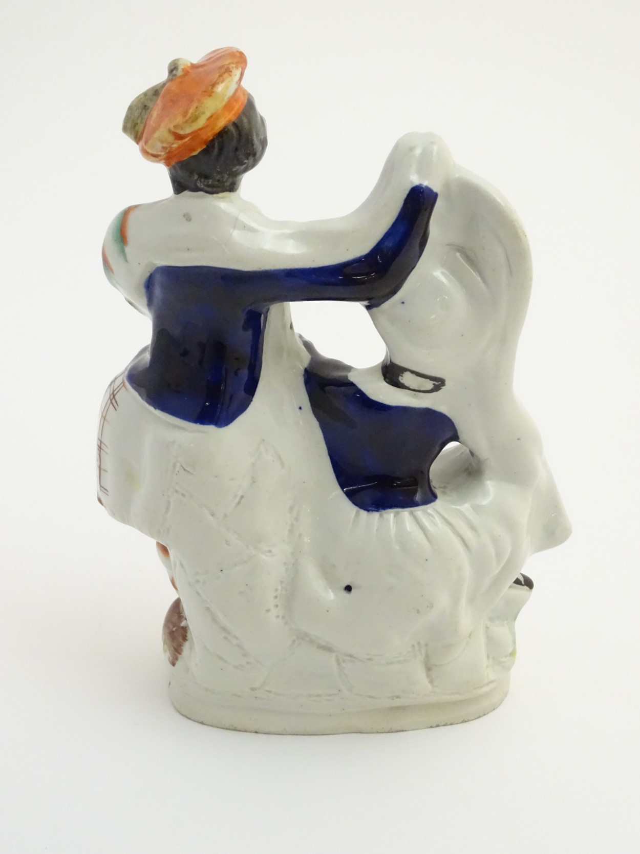 A Victorian Staffordshire pottery figural group of a man and a woman in highland dress, - Image 4 of 6