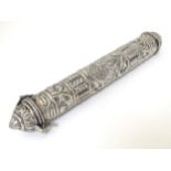 An East Asian white metal prayer scroll holder with banded decoration and hinged end.