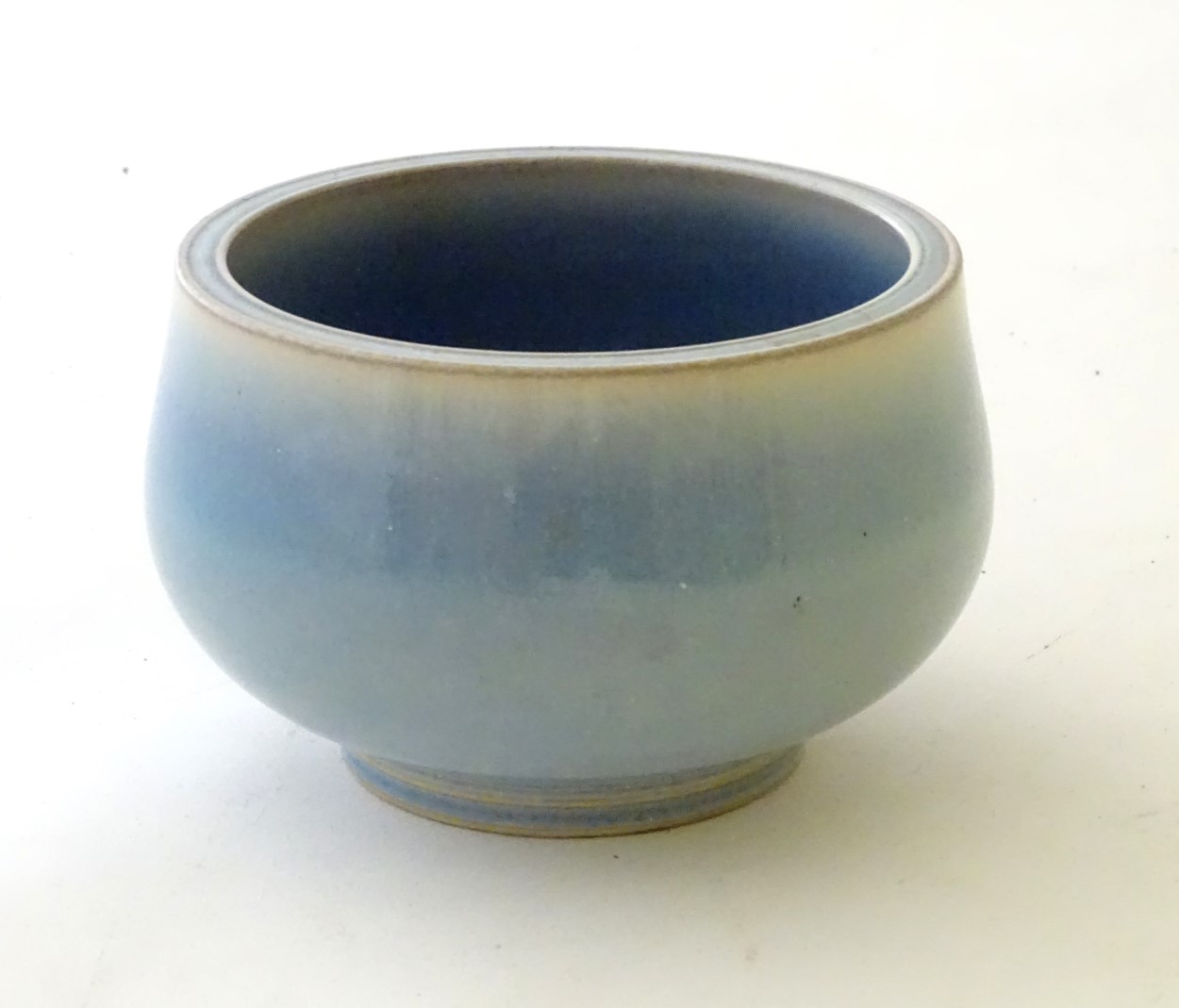 An unmarked high fired blue glazed bowl. Approx. 3" high. - Image 3 of 5