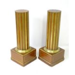 A pair of 19thC Russian column bust stands, formed as fluted mahogany columns with ormolu,