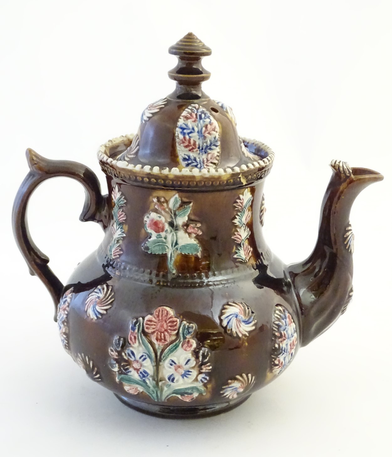A late 19thC Measham bargeware teapot and cover with floral decoration surrounding a plaque - Image 5 of 8