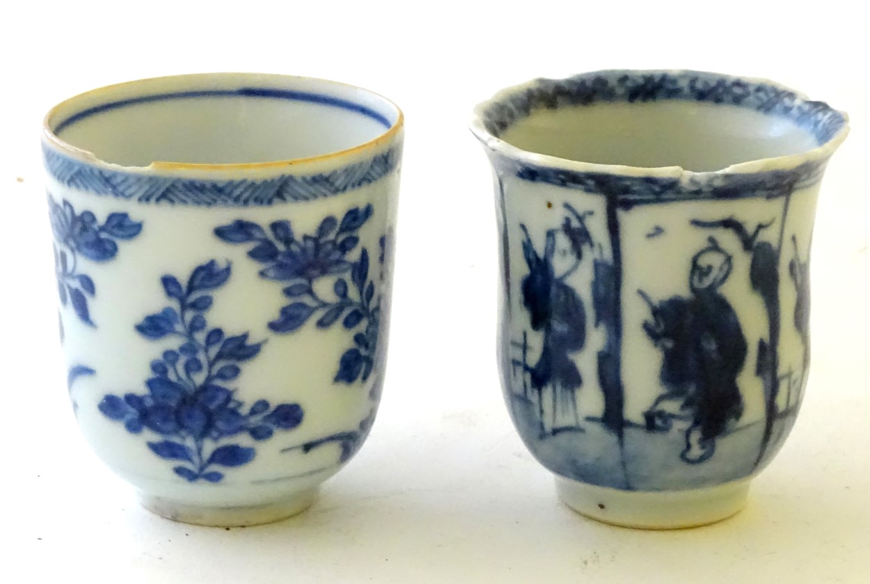 Two Chinese blue and white teacups, one decorated with flowers and foliage, the other with figures. - Image 3 of 6