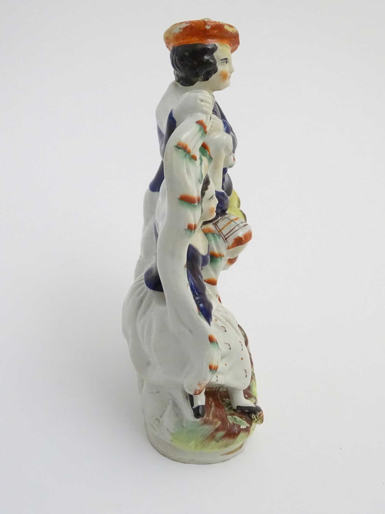 A Victorian Staffordshire pottery figural group of a man and a woman in highland dress, - Image 5 of 6