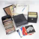 A quantity of records and a record player CONDITION: Please Note - we do not make