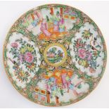 A famille rose Cantonese charger decorated with 4 panels, 2 depicting domestic scenes with figures,