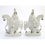 A pair of Victorian Staffordshire pottery flatback figures modelled as Bonnie Prince Charlie on