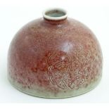 A Chinese sang-de-boeuf pot/taibai zun formed as a dome,