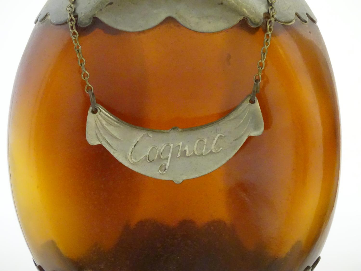 A pair of dimple like brown glass and pewter mounted decanters with bottle tags marked 'Cognac' & - Image 4 of 16